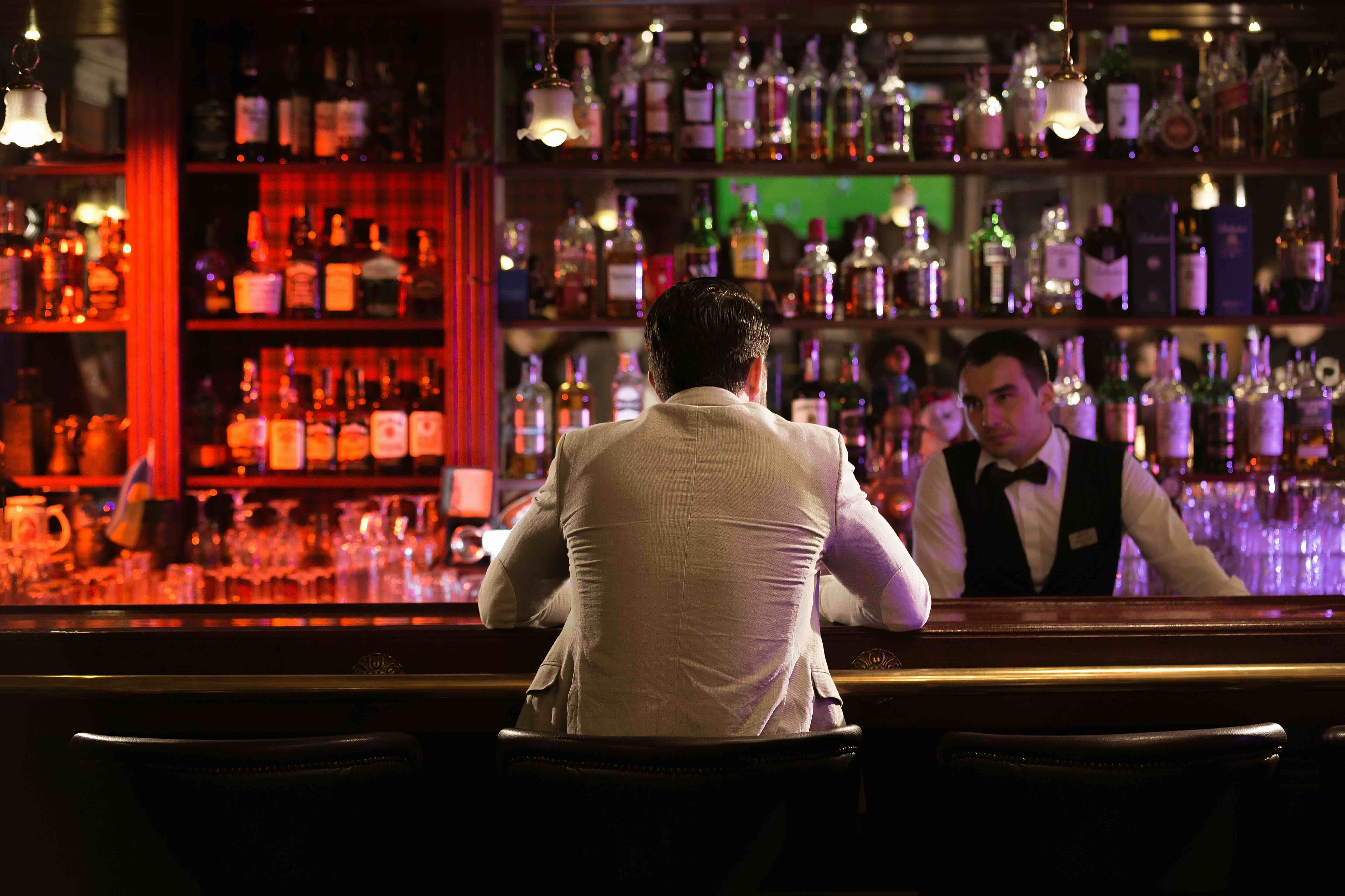 man sitting in a nightclub