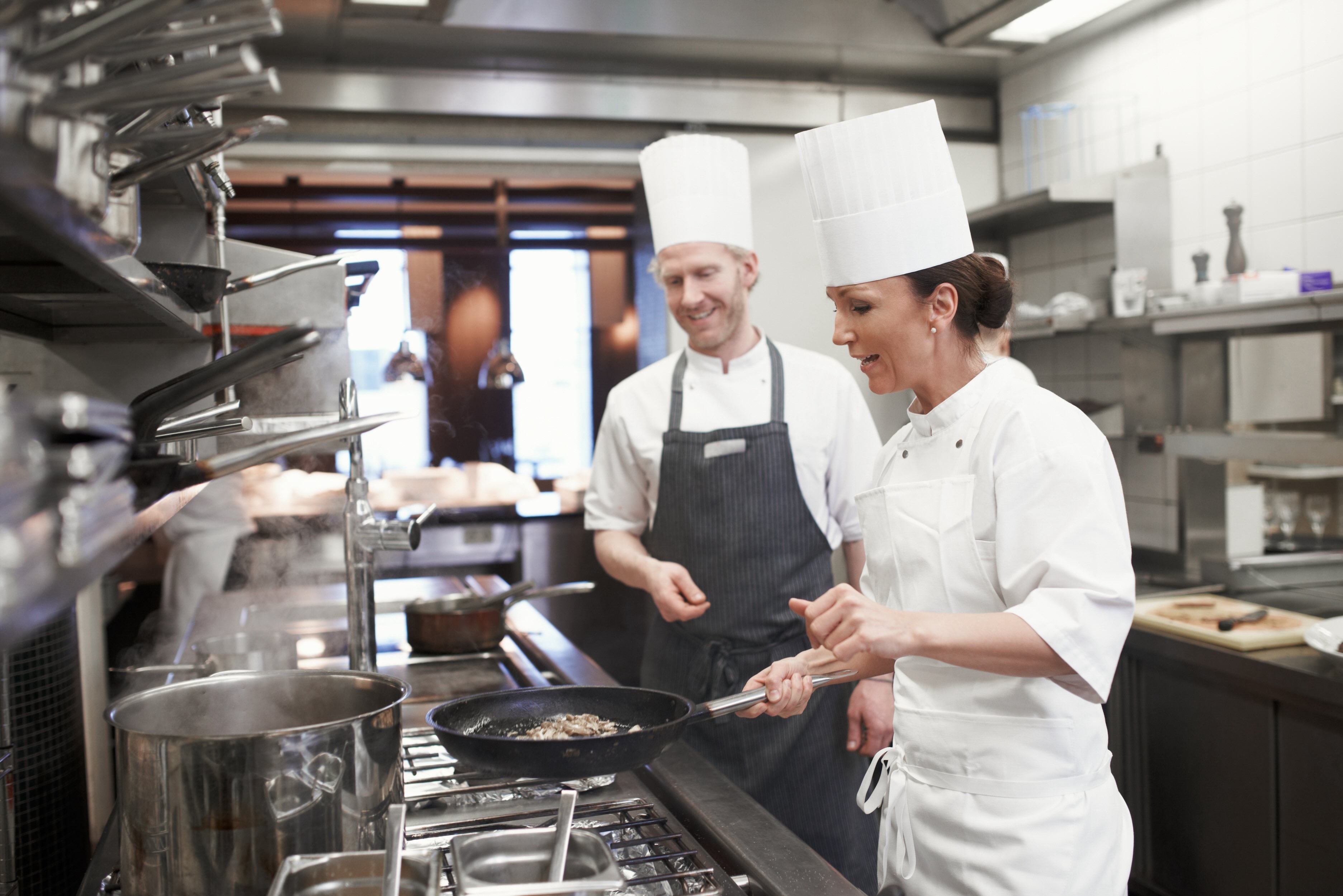 commercial kitchen chef working with crews