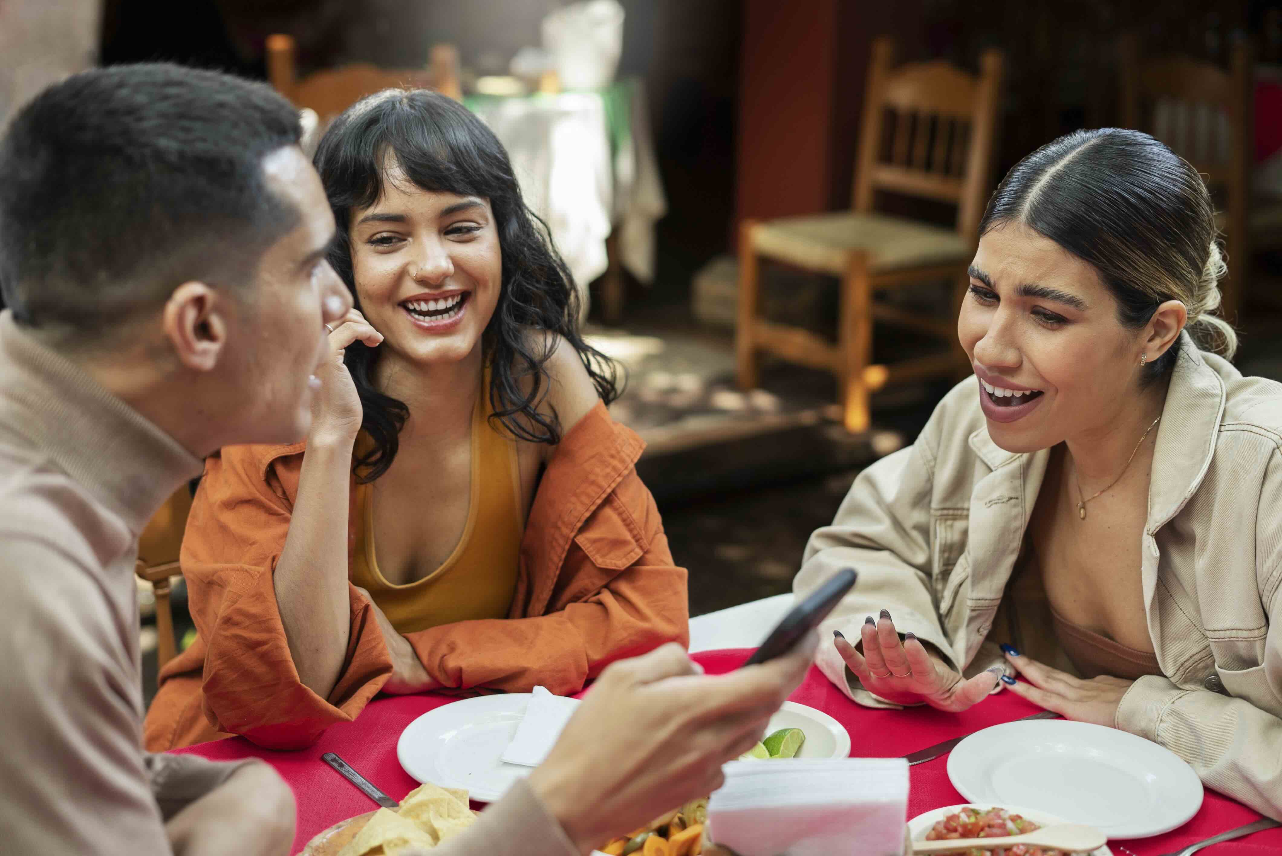 friends enjoying together in a malaysian restaurant