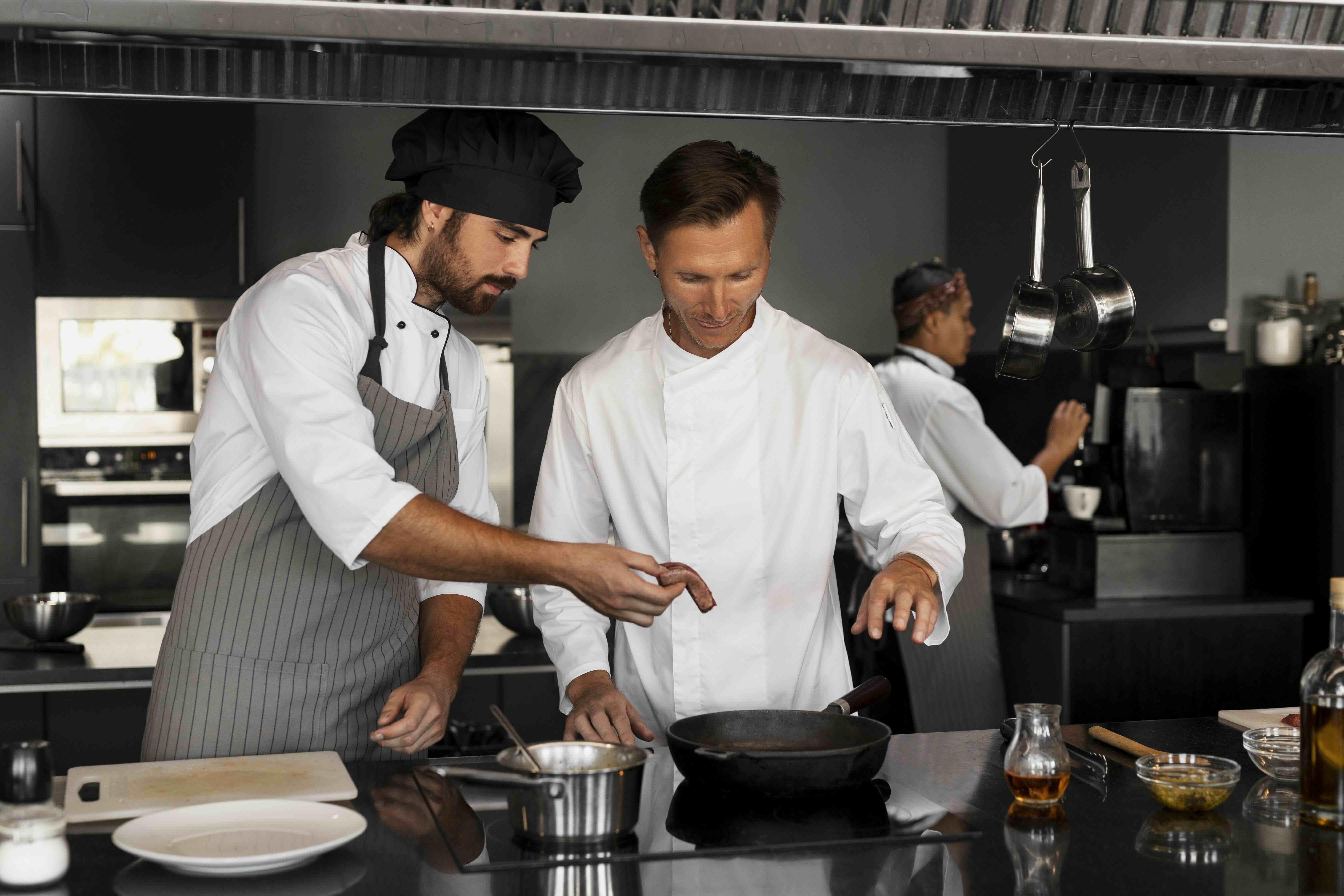 chef and team working in a commercial kitchen of a fine dining restaurant